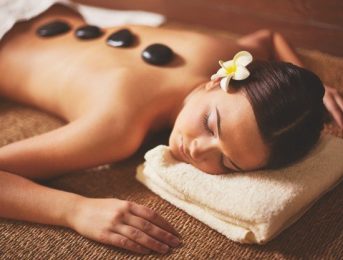 woman-enjoying-stone-massage_1098-3182-1556531271