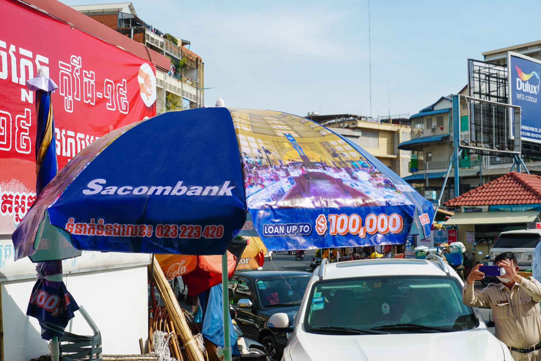 Sacombank Cambodia sponsored umbrellas and dustbins to Orussey Market Commission