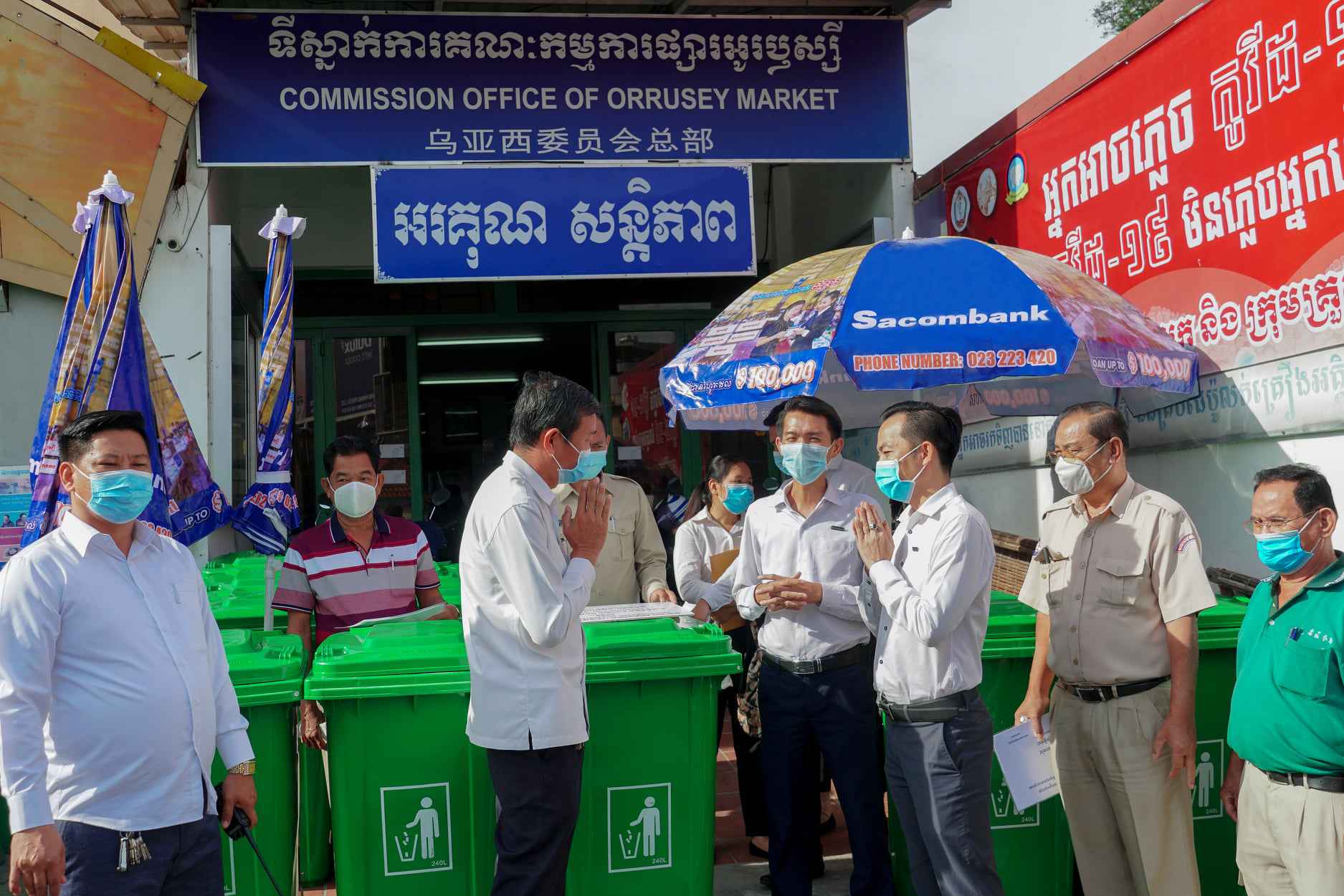 Sacombank Cambodia sponsored umbrellas and dustbins to Orussey Market Commission